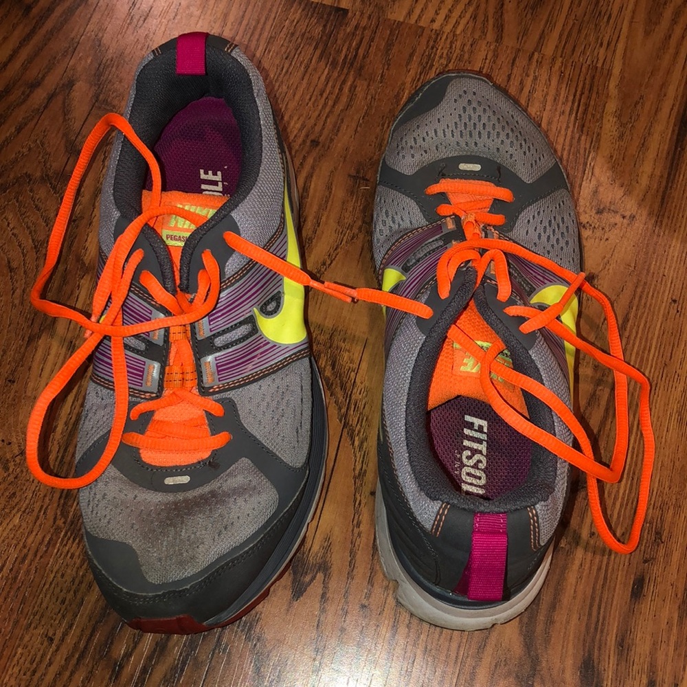 Women’s multi color Nike running shoes